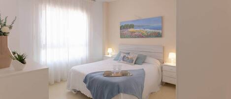 2 dormitorios, tabla de planchar con plancha, wifi gratis y ropa de cama