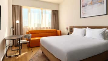 Premium bedding, memory-foam beds, minibar, in-room safe