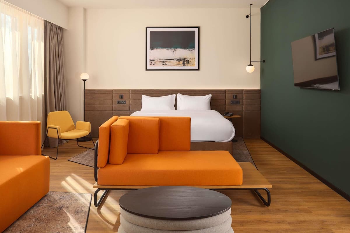 Family Suite, 1 King Bed with Sofa bed, Accessible | Premium bedding, memory foam beds, minibar, in-room safe