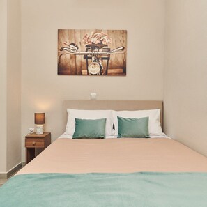 2 habitaciones, tabla de planchar con plancha, wifi y ropa de cama 