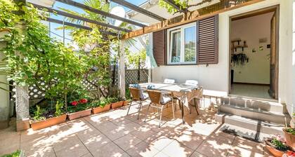 Mediterranean vacation home only 550 meters to the beach with barbecue area, private terrace, parking space