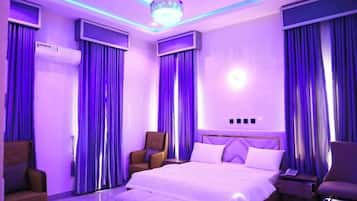 Deluxe Room, Balcony, City View | Desk, laptop workspace, blackout curtains, soundproofing