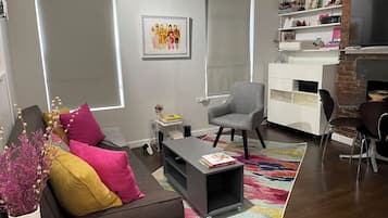 Smart TV, fireplace, books