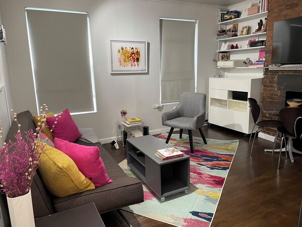 Smart TV, fireplace, books