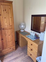 Individually decorated, desk, laptop workspace, blackout drapes