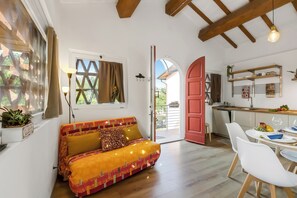 Family Apartment, Multiple Bedrooms (Cozy Apt inTypical Hayloft with) | Living area | 21-inch TV with digital channels