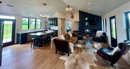 Eagles Crossing is a Newly Renovated 3-Bed Farmhouse with a Large Deck & Hot Tub