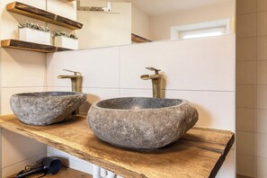 Eco-friendly toiletries, hair dryer, towels, soap