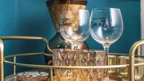 Two glasses on a tray, one labeled "Infinitely Tonic" and the other "This is definitely Gin & Tonic." - 4 Executive self catering Apartments, two with private hot tubs. (Cape Town)