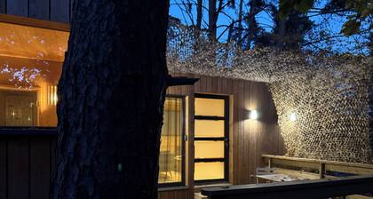 Under the pines with sauna and jacuzzi (Emilie)