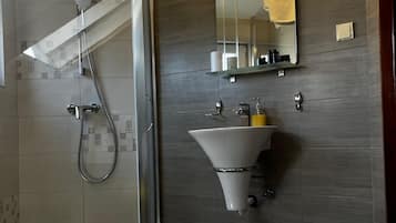 Classic Apartment, 1 Bedroom | Bathroom | Shower, hair dryer, slippers, towels