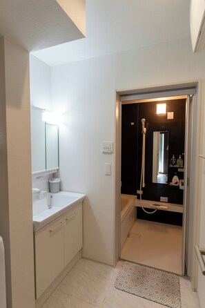 Hair dryer, bidet, towels, soap