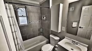 Shower, towels, toilet paper