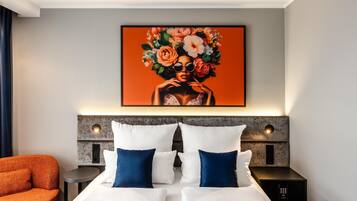 Premium bedding, in-room safe, blackout drapes, soundproofing