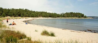Semi-detached house near the sea, Gotland ferry and archipelago boats