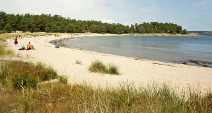 Semi-detached house near the sea, Gotland ferry and archipelago boats