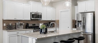 Relax and recharge at this luxury Boise retreat featuring a private hot tub, sauna, fire pit, game room, and Peloton. Perfect for families, groups, and weekend getaways, this spacious 4-bedroom home comfortably sleeps 9 and is conveniently located.