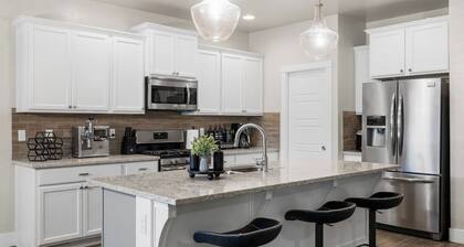 Relax and recharge at this luxury Boise retreat featuring a private hot tub, sauna, fire pit, game room, and Peloton. Perfect for families, groups, and weekend getaways, this spacious 4-bedroom home comfortably sleeps 9 and is conveniently located.