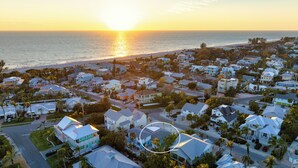 A coastal residential area with houses and a beach. - ⚓Mermaid Sunset! Coastal beach home w/pool 200 steps to beach!⚓ (Holmes Beach)