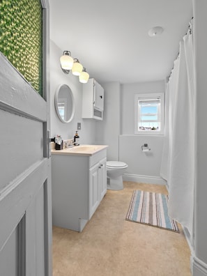 Hair dryer, towels, soap, shampoo