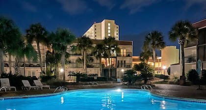 Experience the best of Biloxi. ✨ Luxury 2BR retreat steps from the beach & Casino District. Sophisticated, central, and exclusive. Book now!