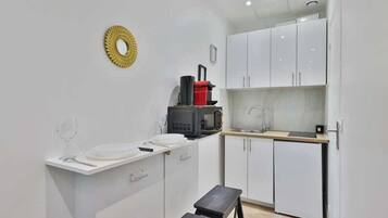 Microwave, stovetop, coffee/tea maker, toaster