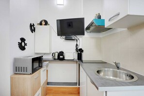 Microwave, stovetop, coffee/tea maker, toaster