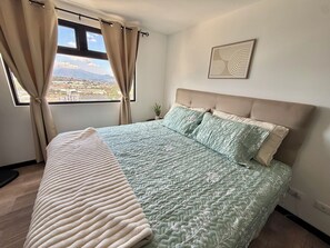 3 dormitorios, tabla de planchar con plancha, wifi gratis y ropa de cama