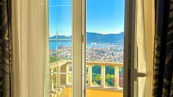 Deluxe Triple Room, Balcony, Sea View | Terrace/patio