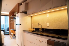 Fridge, microwave, coffee/tea maker, blender
