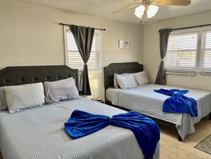 4 bedrooms, desk, iron/ironing board, travel cot