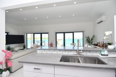 4-Bedroom, 4-Bath Oasis in Treasure Cay – WiFi, AC, Steps from the Water
