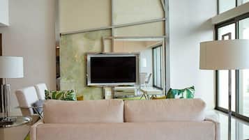 Penthouse Deluxe, vista a la playa | Área de sala de estar