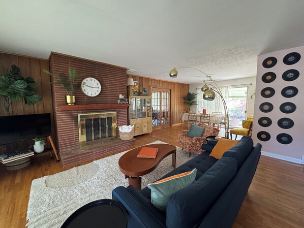 Smart TV, fireplace, foosball, books