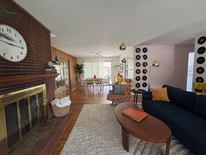 Smart TV, fireplace, foosball, books