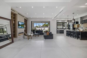 Luxury Villa, Multiple Beds, Private Pool, Pool View (Villa Califa) | Living area | 55-inch flat-screen TV with digital channels, fireplace - Villa Califa - Resort-style Living w/ Private Pool, Spa & Theater (Woodland Hills)