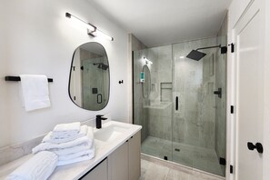 Shower, hair dryer, towels