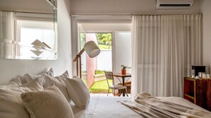 Suite deluxe com banheira | 1 bedroom, premium bedding, minibar, free WiFi - Frangipani Hotel Boutique (Brotas)