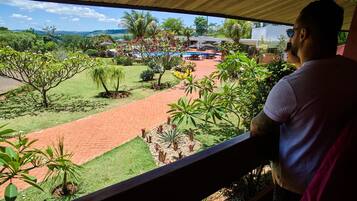Suite, vista giardino | 1 camera, biancheria da letto di alta qualità, minibar, Wi-Fi gratuito