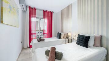 2 slaapkamers, een strijkplank/strijkijzer, gratis wifi, beddengoed