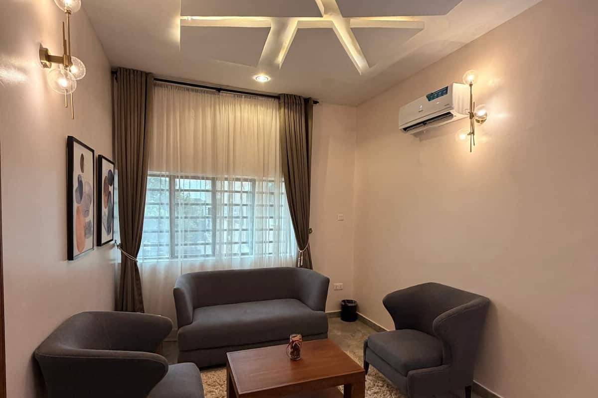 Executive-Suite, Balkon, Stadtblick | Wohnbereich