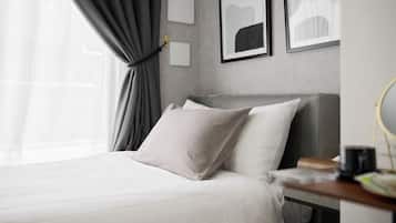 Hypo-allergenic bedding, down duvets, free minibar