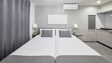 Deluxe Twin Room, Non Smoking | Peralatan tempat tidur hipoalergenik, gebar bulu kapas