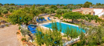 Casa de vacaciones 'Villetta Cosimo' con piscina compartida, jardín privado y aire acondicionado