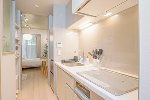 Apartment, 1 Double Bed with Sofa bed, Non Smoking, Kitchen (102) | Private kitchen | Full-size fridge, microwave, oven, stovetop - Ken's Place Minami-Azabu (Tokyo)