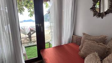 Luxury Suite, Balcony, Beach View | In-room safe, blackout drapes, soundproofing, free WiFi