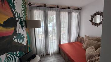 Luxury Suite, Balcony, Beach View | Living area | Flat-screen TV