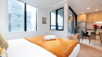 Deluxe Studio, Balcony, City View | Desk, laptop workspace, soundproofing, free WiFi