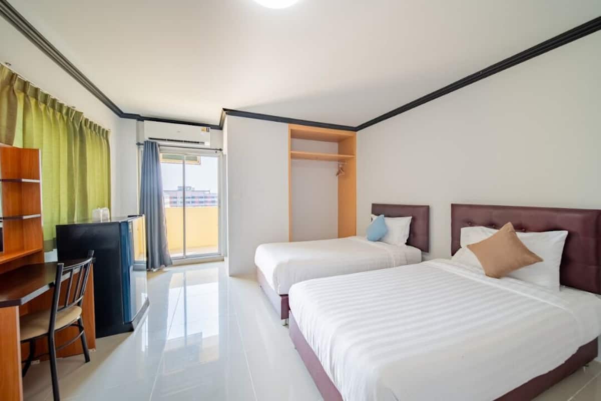 Habitación estándar con 2 camas individuales | Wifi gratis y ropa de cama