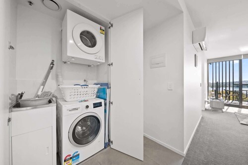 Sleek 2-Bed Apartment with Rooftop Garden Access